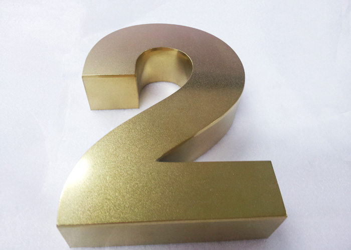 Stainless steel welded metal polished brass letter logo