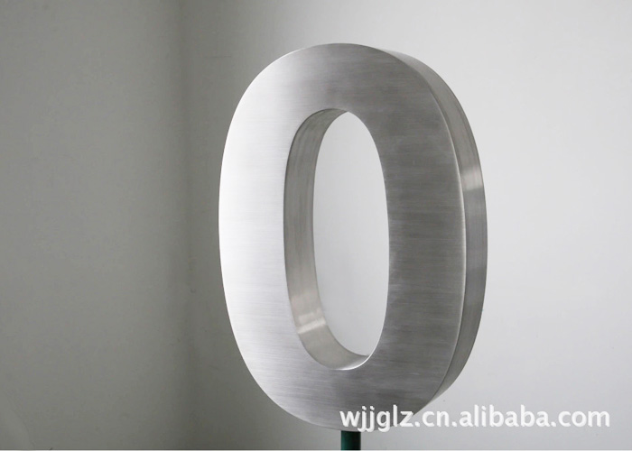 Floating brushed stainless steel letters