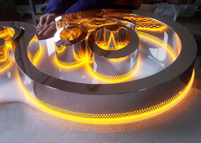 Glowing crystal letters on the back of outdoor signboard