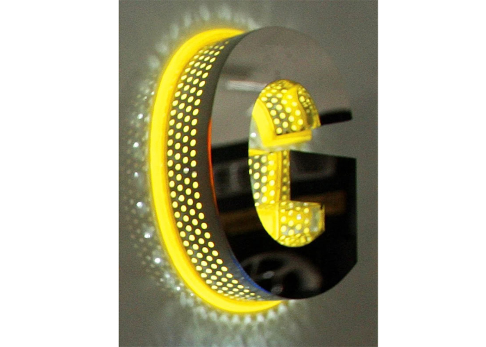 Illuminated letter logo on the back with side holes