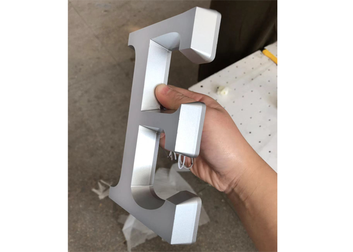 Stainless steel assembled mini letter logo