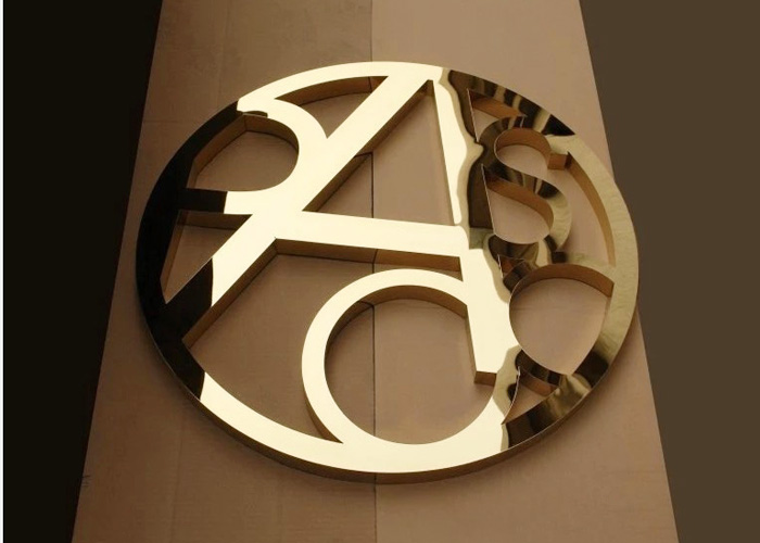 Round polished mirror stainless steel logo