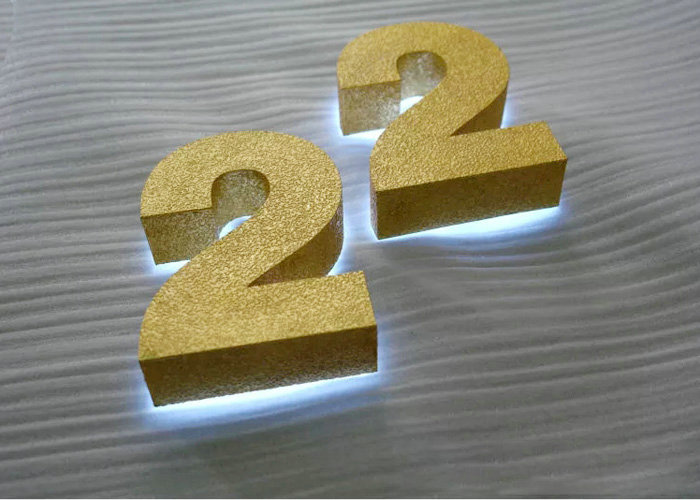 Stainless steel burnishing the letter with gold foil finish