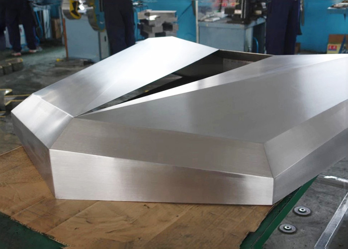 Large brushed stainless steel letters with polished surface